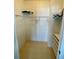 Walk-in closet with ample shelving, providing plenty of storage space at 34071 Avocado N Dr, Pinellas Park, FL 33781