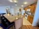 Well-equipped kitchen featuring an island and ample cabinetry at 34071 Avocado N Dr, Pinellas Park, FL 33781