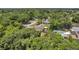 Aerial view showcasing a house nestled among lush greenery at 3445 10Th N Ave, St Petersburg, FL 33713