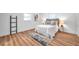 Bright bedroom with light wood flooring and neutral decor at 3445 10Th N Ave, St Petersburg, FL 33713