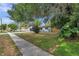 Single-story home with a well-maintained lawn and walkway at 3445 10Th N Ave, St Petersburg, FL 33713