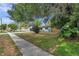 Updated home with a spacious front yard and mature trees at 3445 10Th N Ave, St Petersburg, FL 33713