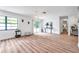 Open living area with hardwood floors and access to the backyard at 3445 10Th N Ave, St Petersburg, FL 33713
