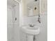 Clean bathroom with pedestal sink and shower stall at 425 20Th Ne Ave, St Petersburg, FL 33704