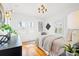 Spacious bedroom with hardwood floors and a neutral color scheme at 425 20Th Ne Ave, St Petersburg, FL 33704