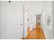 Bright hallway with hardwood floors and white walls at 425 20Th Ne Ave, St Petersburg, FL 33704
