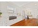 Modern kitchen with white cabinets and a farmhouse sink at 425 20Th Ne Ave, St Petersburg, FL 33704