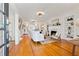 Bright living room with hardwood floors, fireplace, and ample seating at 425 20Th Ne Ave, St Petersburg, FL 33704