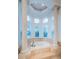 Elegant bathroom with soaking tub and large windows at 4419 Bayshore Ne Blvd, St Petersburg, FL 33703