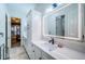 Modern bathroom with white cabinets and quartz countertops at 4419 Bayshore Ne Blvd, St Petersburg, FL 33703