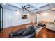 Spacious bonus room features hardwood floors, comfortable seating, and a large TV at 4419 Bayshore Ne Blvd, St Petersburg, FL 33703