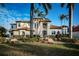 Mediterranean-style home with a landscaped yard and driveway at 4419 Bayshore Ne Blvd, St Petersburg, FL 33703