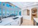 Open kitchen features a large island and modern appliances at 4419 Bayshore Ne Blvd, St Petersburg, FL 33703