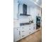 Modern kitchen features stainless steel appliances and white shaker cabinets at 4419 Bayshore Ne Blvd, St Petersburg, FL 33703