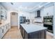 Modern kitchen with stainless steel appliances and white cabinetry at 4419 Bayshore Ne Blvd, St Petersburg, FL 33703