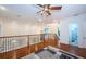Spacious landing area overlooking the main floor with hardwood floors at 4419 Bayshore Ne Blvd, St Petersburg, FL 33703