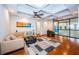 Relaxing living room with hardwood floors, coffered ceiling, and large windows at 4419 Bayshore Ne Blvd, St Petersburg, FL 33703