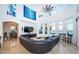 Large living room with sectional sofa and expansive water views at 4419 Bayshore Ne Blvd, St Petersburg, FL 33703