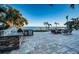 Outdoor kitchen with stonework and a built-in grill at 4419 Bayshore Ne Blvd, St Petersburg, FL 33703