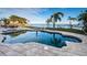 Relaxing pool with water reflecting the sky and palm trees at 4419 Bayshore Ne Blvd, St Petersburg, FL 33703