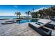 Relaxing poolside view with lounge chairs and waterfront view at 4419 Bayshore Ne Blvd, St Petersburg, FL 33703