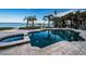 Irregular shaped pool with spa and waterfront view at 4419 Bayshore Ne Blvd, St Petersburg, FL 33703