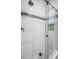 Clean shower with glass enclosure, marble tile, and modern fixtures at 4419 Bayshore Ne Blvd, St Petersburg, FL 33703