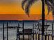 Stunning sunset view over calm water from a dock at 4419 Bayshore Ne Blvd, St Petersburg, FL 33703