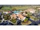 Aerial view of Lakewood National community clubhouse and pool area at 5695 Palmer Cir # 202, Bradenton, FL 34211