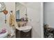 Small bathroom with sink and storage at 5885 110Th N Ave, Pinellas Park, FL 33782