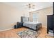 Serene bedroom with wood floors and a ceiling fan at 5909 Yorkshire Dr, Zephyrhills, FL 33542