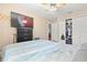 Cozy bedroom with ample closet space and a dresser at 5909 Yorkshire Dr, Zephyrhills, FL 33542