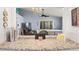 Kitchen features granite countertops and a pass-through to the living area at 5909 Yorkshire Dr, Zephyrhills, FL 33542