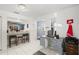 Kitchen with granite countertop, gray cabinets, and home office area at 5909 Yorkshire Dr, Zephyrhills, FL 33542
