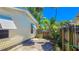 Small backyard patio with access from back door at 616 2Nd Nw Ave, Largo, FL 33770