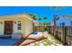 Home's backyard features a deck and walkway at 616 2Nd Nw Ave, Largo, FL 33770