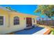 Home's exterior and deck with a nice backyard at 616 2Nd Nw Ave, Largo, FL 33770