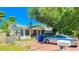 Quaint house with brick driveway and mature trees at 616 2Nd Nw Ave, Largo, FL 33770
