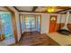 Living room with fireplace and wood flooring at 616 2Nd Nw Ave, Largo, FL 33770