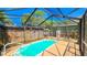 Private screened-in pool in backyard oasis at 616 2Nd Nw Ave, Largo, FL 33770