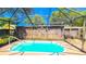 Refreshing screened pool ready for summer fun at 616 2Nd Nw Ave, Largo, FL 33770