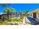 Charming backyard retreat featuring a screened pool and spacious deck at 616 2Nd Nw Ave, Largo, FL 33770