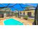 Enjoy this screened-in pool and patio area at 616 2Nd Nw Ave, Largo, FL 33770