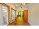 Sunroom offers brick floors, stone wall, and kitchen access at 616 2Nd Nw Ave, Largo, FL 33770
