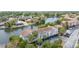 Aerial view of a waterfront property, showcasing its location and amenities at 6325 Newtown Cir # 25B2, Tampa, FL 33615