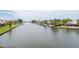 Waterfront community with lush landscaping and canal views at 6325 Newtown Cir # 25B2, Tampa, FL 33615