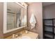 Clean bathroom with vanity, mirror, and shower at 6325 Newtown Cir # 25B2, Tampa, FL 33615