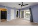 Spacious bedroom with balcony access and water views at 6325 Newtown Cir # 25B2, Tampa, FL 33615
