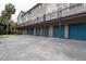Two-story building with private garages and parking at 6325 Newtown Cir # 25B2, Tampa, FL 33615
