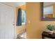 Bright entryway with coat closet and view to kitchen at 6325 Newtown Cir # 25B2, Tampa, FL 33615